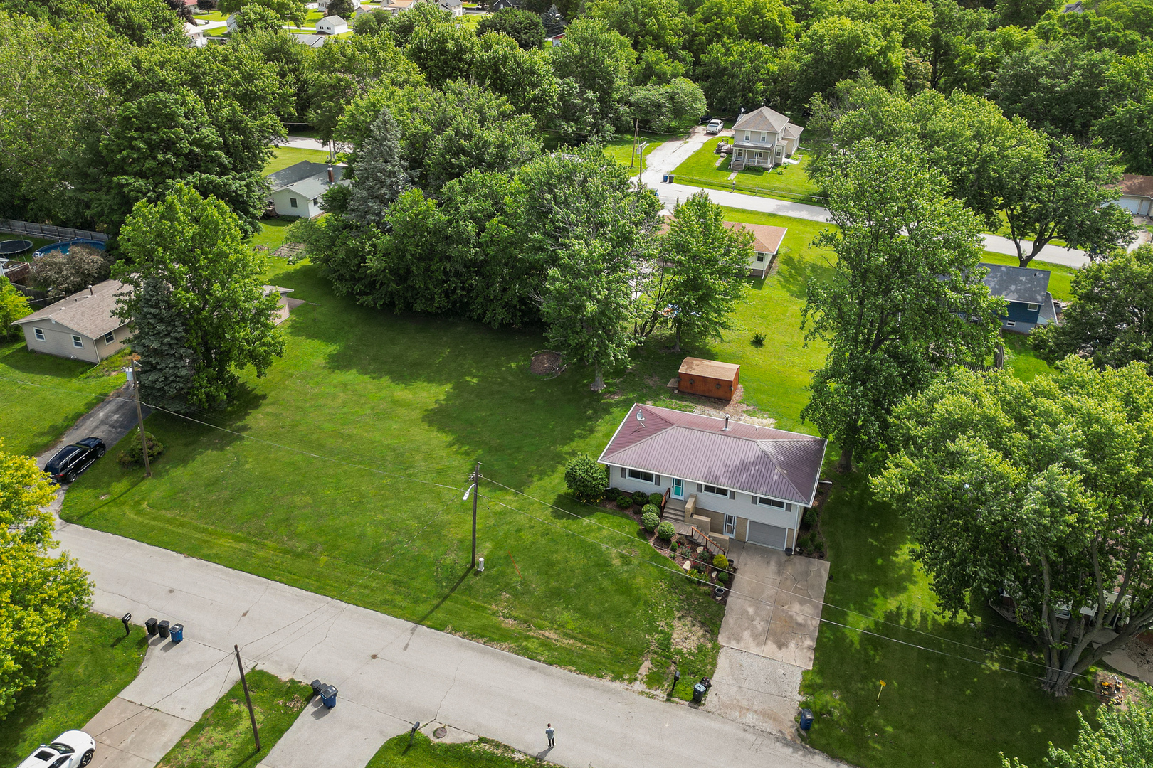 506 Bush Street Reynolds, IL 61279 - Photo 4 of 37 an aerial view of a house with a garden