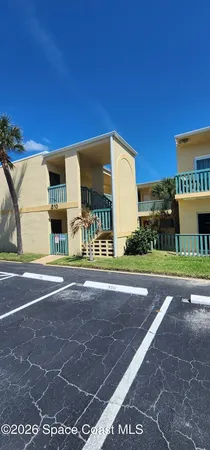 a view of a building with a street