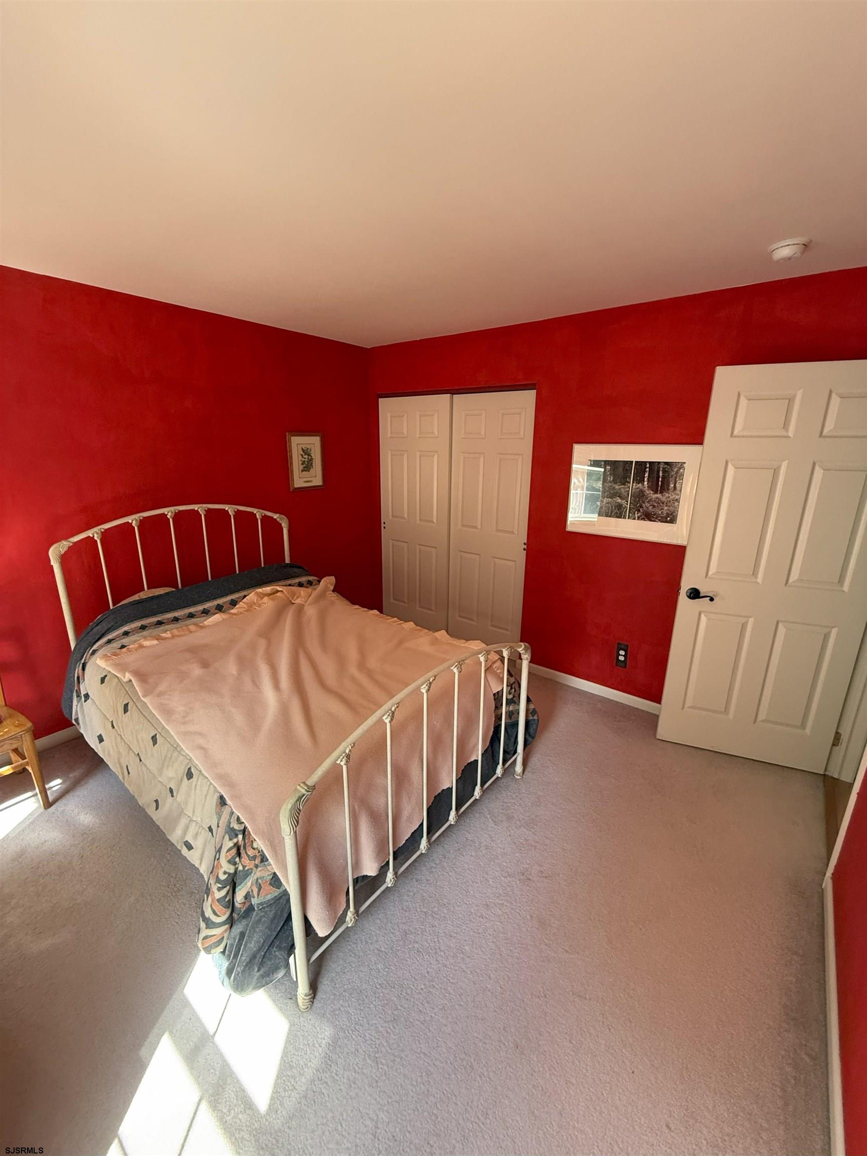 420 North Chew Road Hammonton, NJ 08037 - Photo 13 of 34 a bedroom with a bed and window