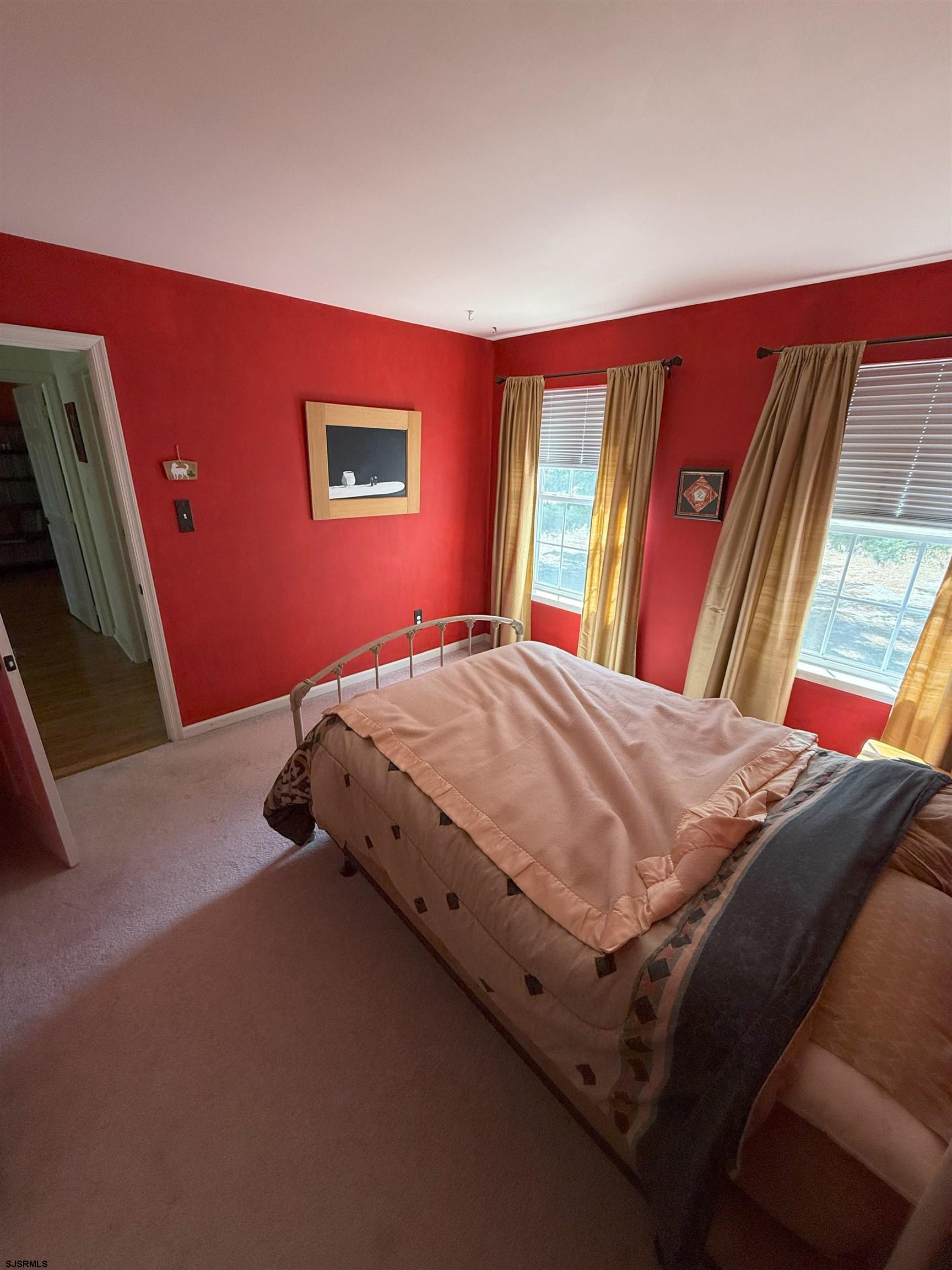 420 North Chew Road Hammonton, NJ 08037 - Photo 14 of 34 a bed sitting in a bedroom next to a window