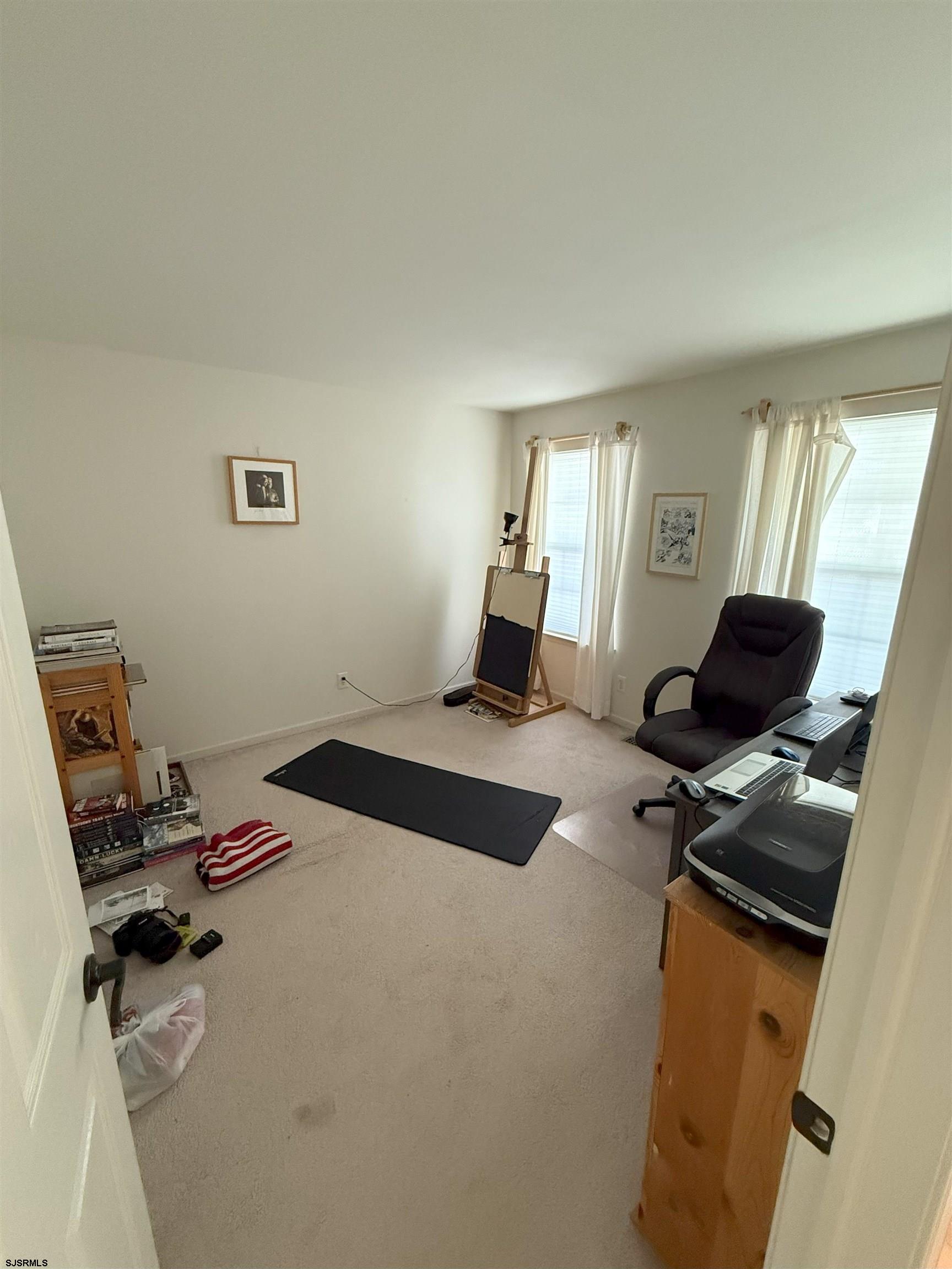 420 North Chew Road Hammonton, NJ 08037 - Photo 17 of 34 a bedroom with a bed and a computer on the desk
