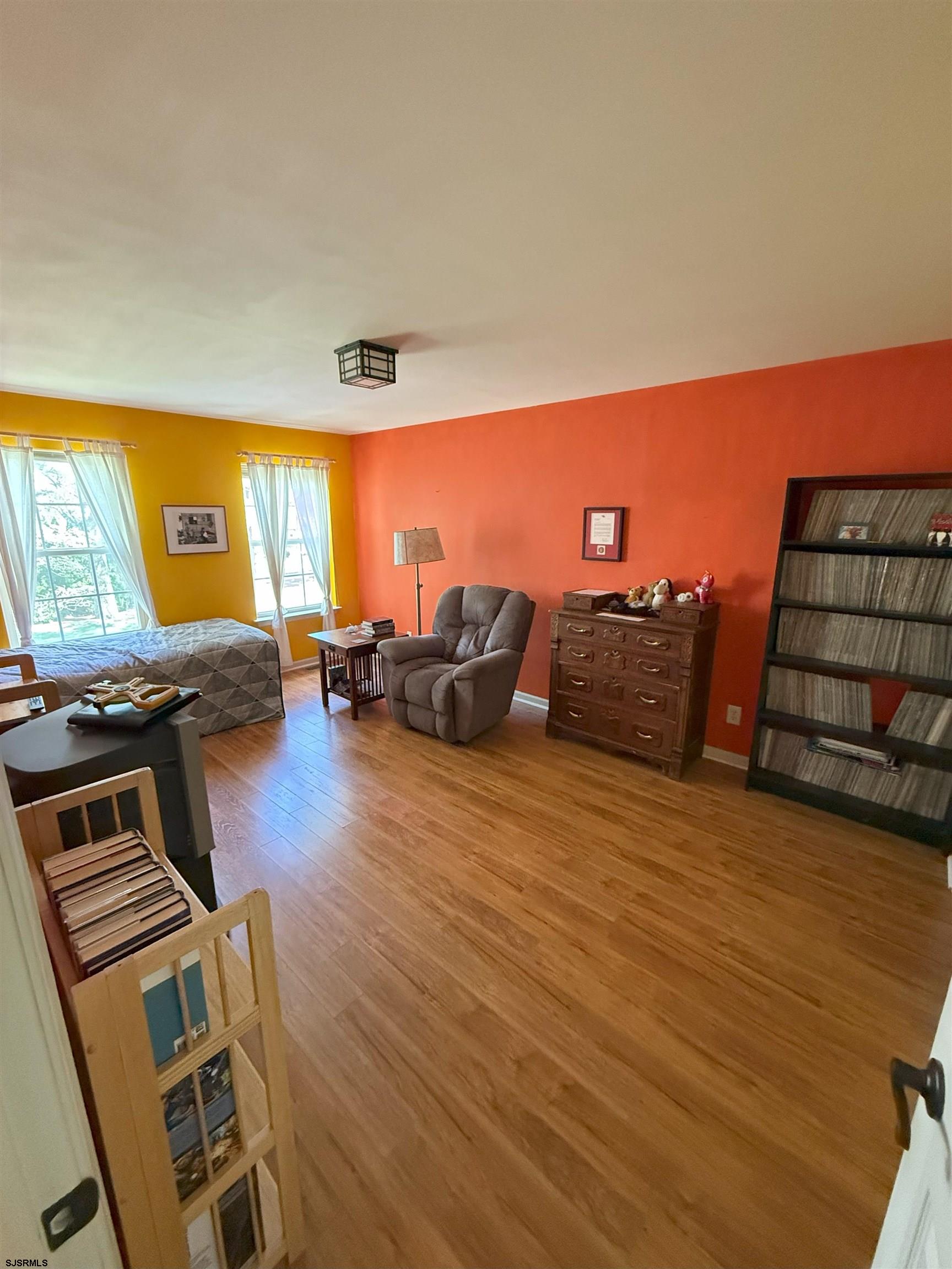 420 North Chew Road Hammonton, NJ 08037 - Photo 18 of 34 a living room with furniture and a flat screen tv