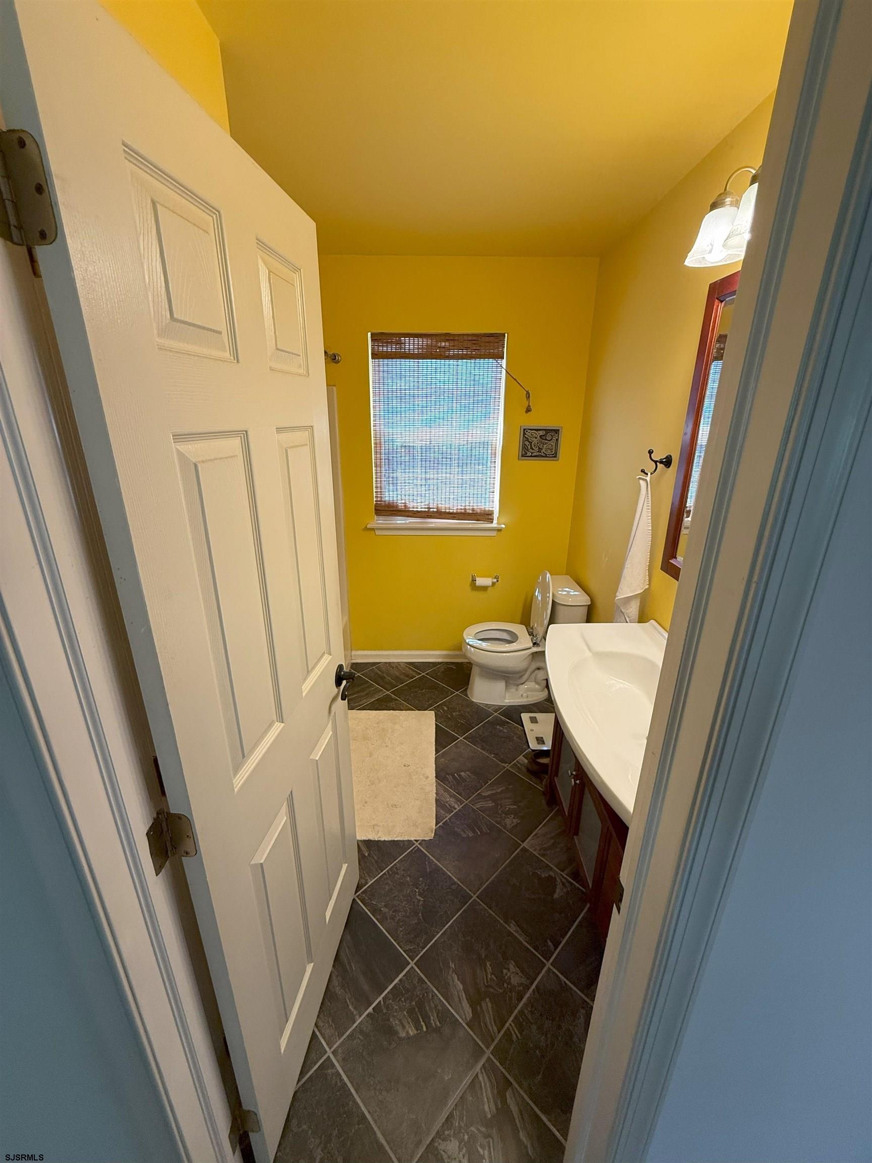420 North Chew Road Hammonton, NJ 08037 - Photo 19 of 34 a bathroom with a sink and a mirror