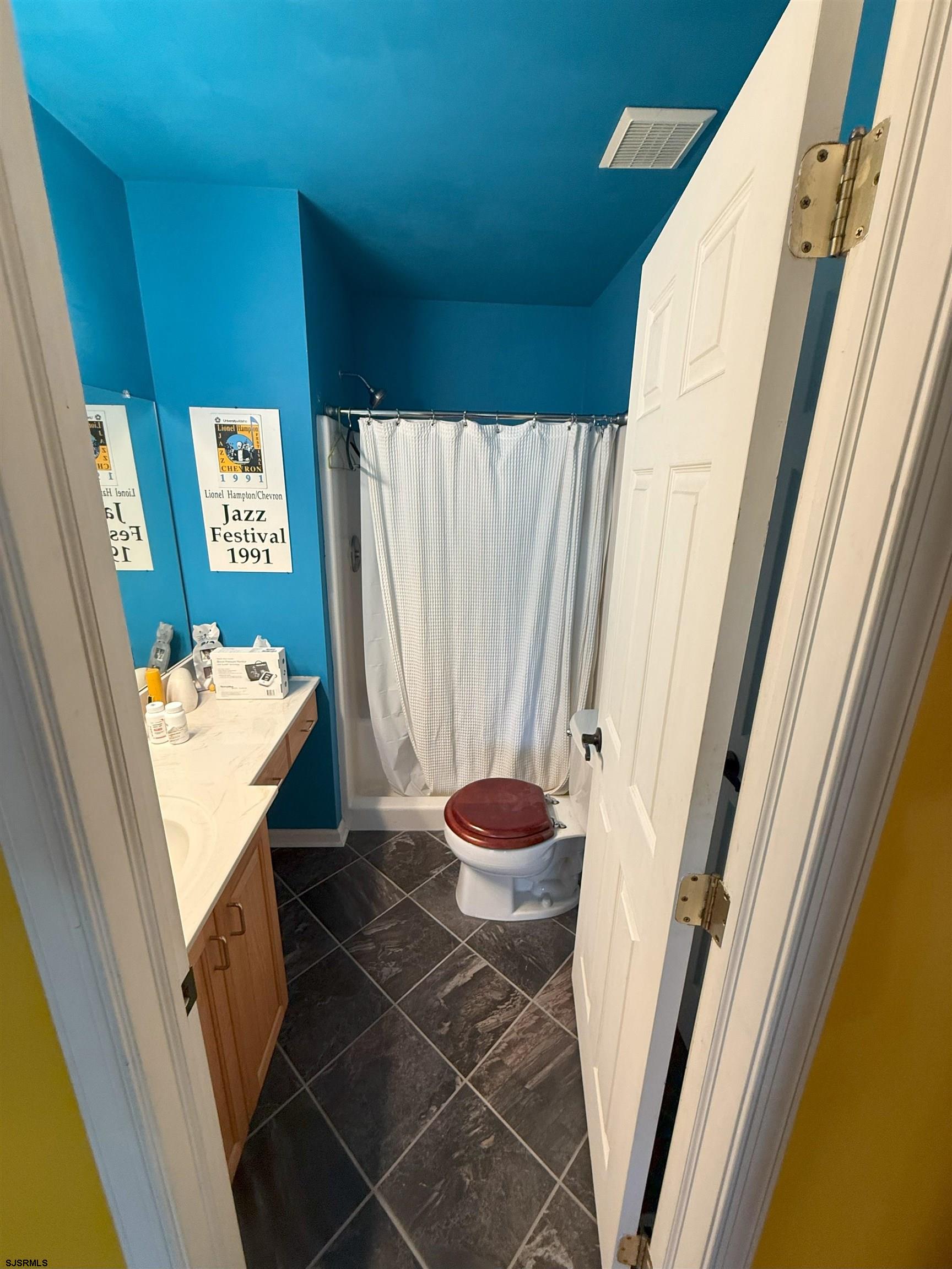 420 North Chew Road Hammonton, NJ 08037 - Photo 20 of 34 a bathroom with a sink and a mirror