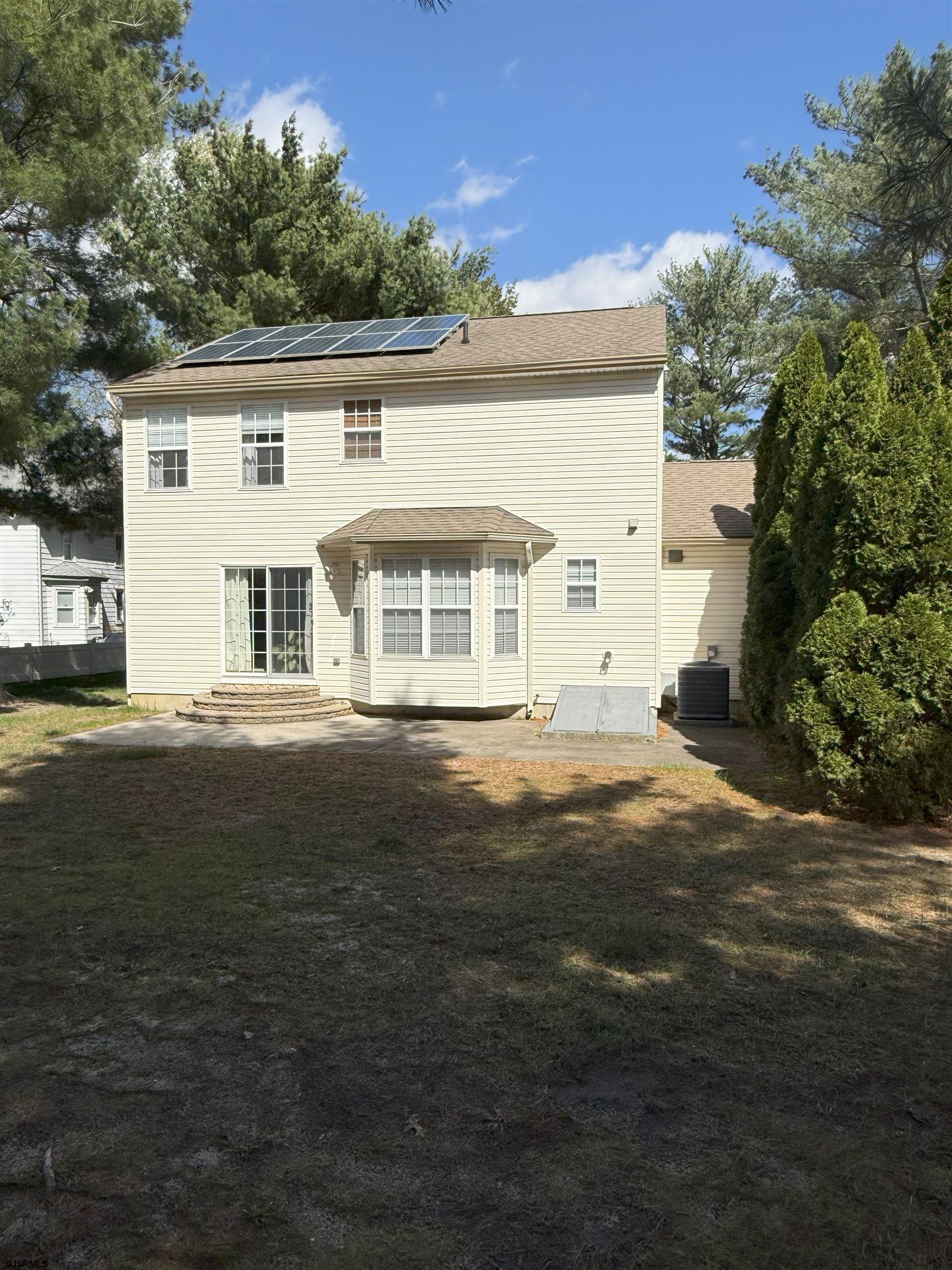 420 North Chew Road Hammonton, NJ 08037 - Photo 26 of 34 a front view of a house with a garden