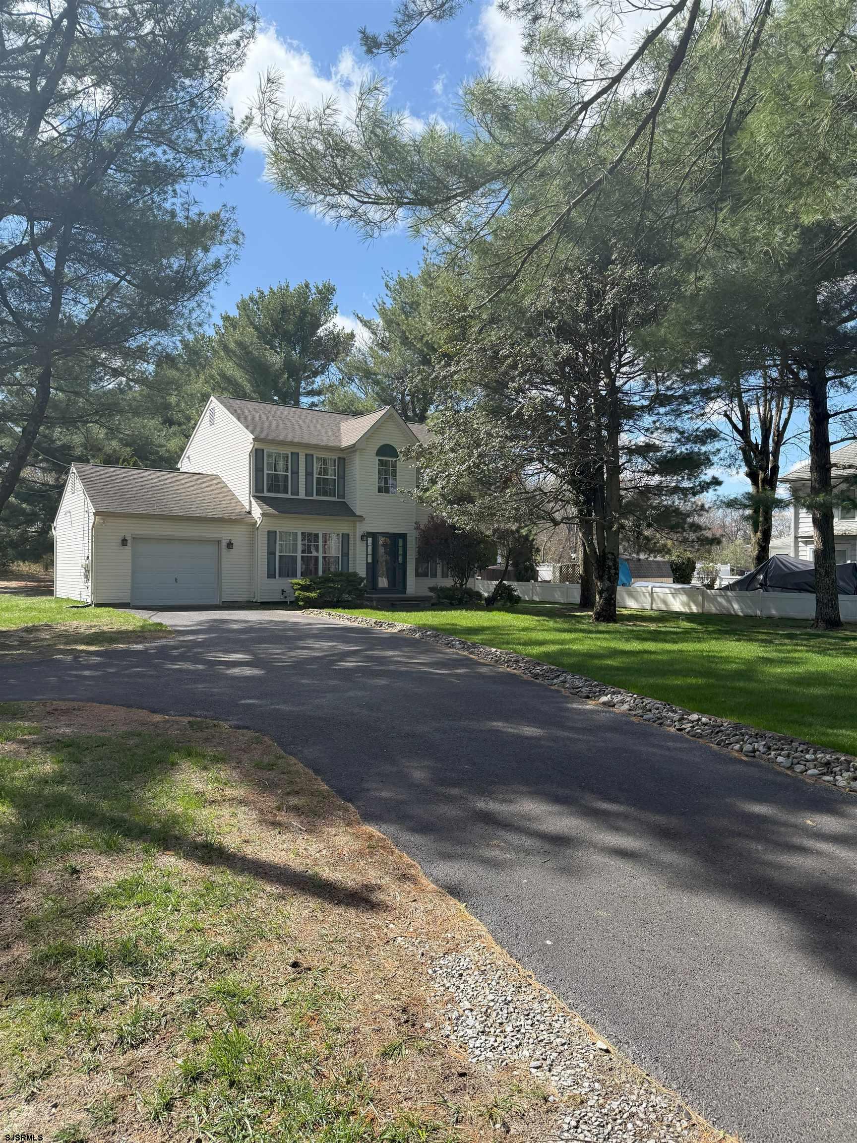 420 North Chew Road Hammonton, NJ 08037 - Photo 29 of 34 a view of a white house with a big yard and large trees