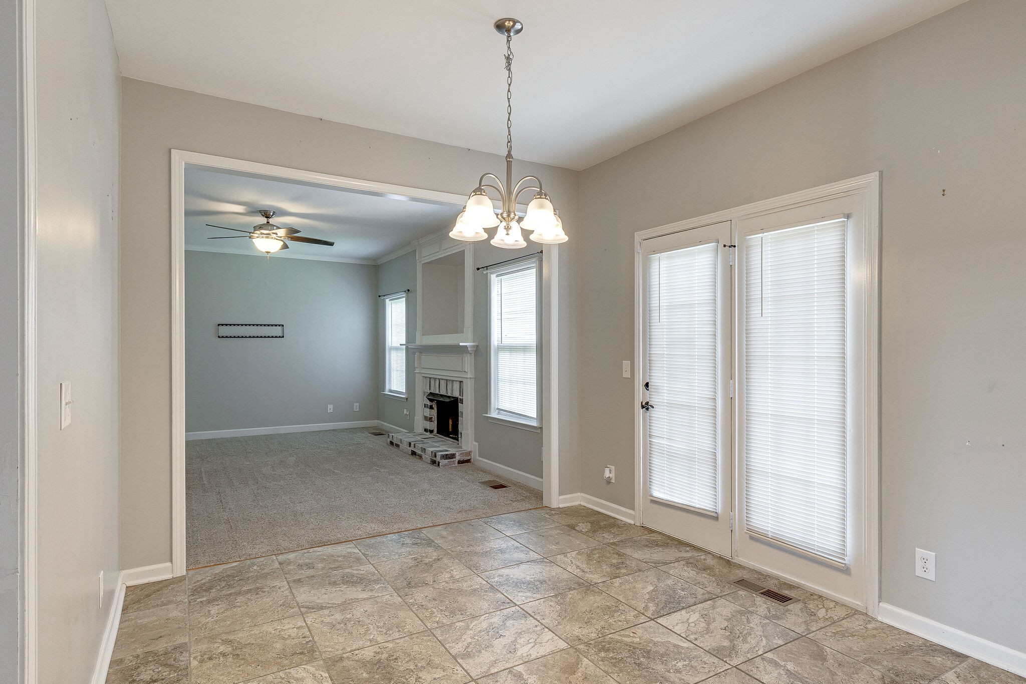 3021 Romain Trail Spring Hill, TN 37174 - Photo 5 of 18 a view of a chandelier in big room and windows