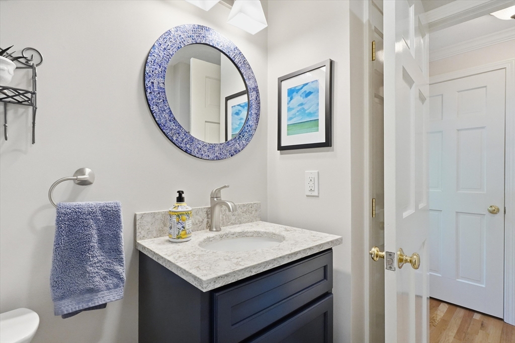 9 Fazio Farm Road Georgetown, MA 01833 - Photo 16 of 42 a bathroom with a granite countertop sink and a mirror