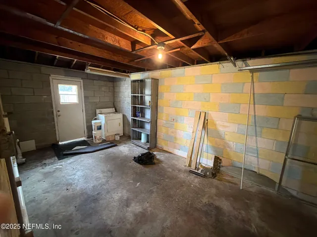 a bathroom with a toilet a sink and a shower