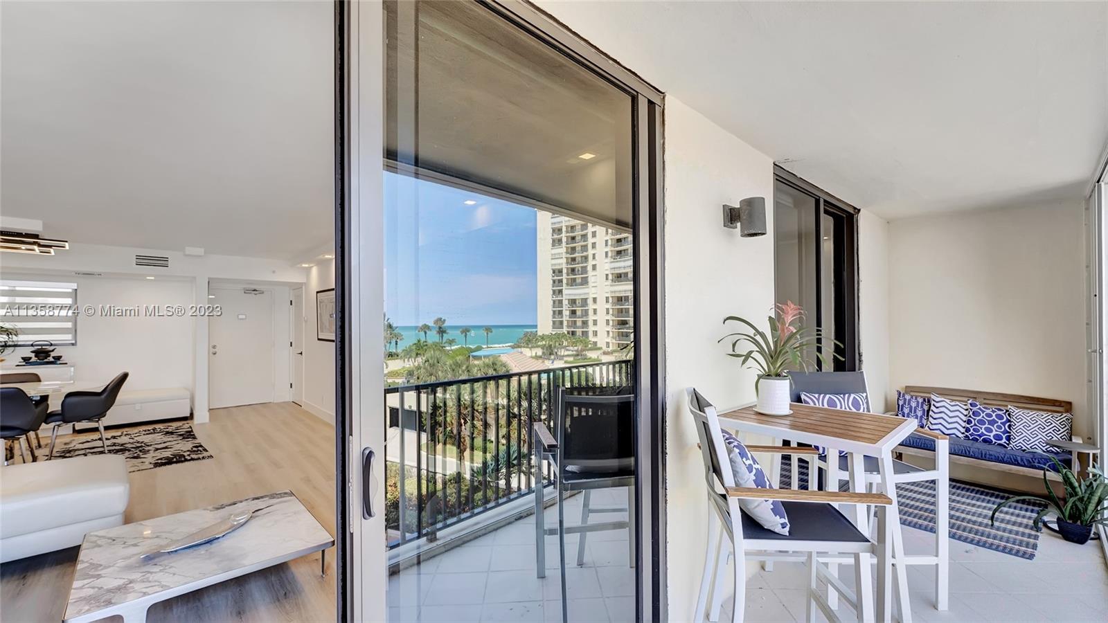 300 Ocean Trail Way, Unit 309 Jupiter, FL 33477 - Photo 21 of 36 a view of a dining room with furniture window and outside view