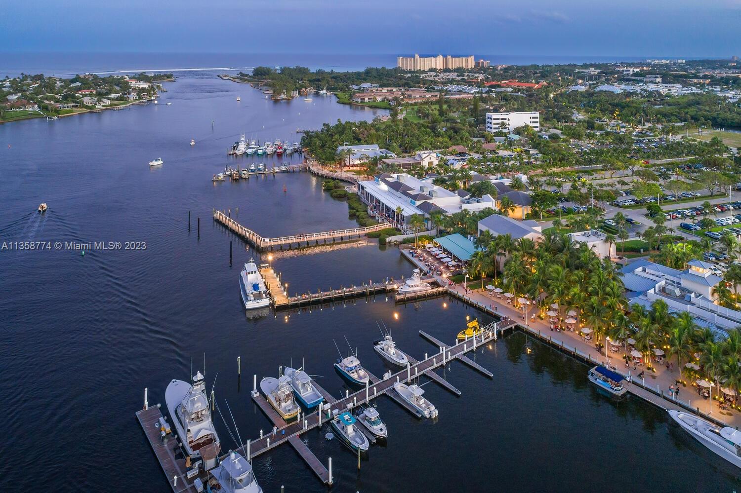 300 Ocean Trail Way, Unit 309 Jupiter, FL 33477 - Photo 30 of 36 an aerial view of a house with a yard