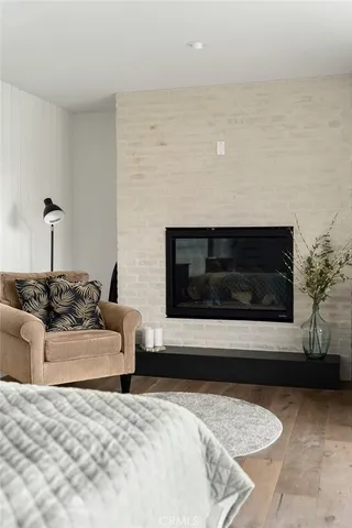 a living room with a couch and a fireplace