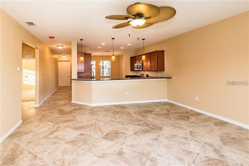 3948 San Rocco Drive, Unit 112 Punta Gorda, FL 33950 - Photo 2 of 18 a view of an empty room and kitchen view
