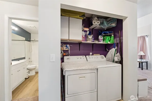 a utility room with dryer and washer
