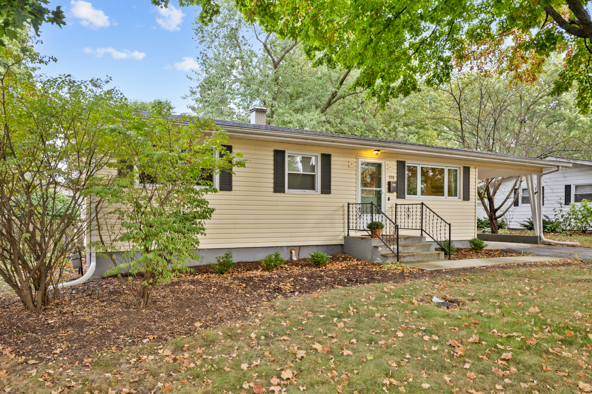 328 South 14th Street St. Charles, IL 60174 - Photo 1 of 26 a house with trees in the background