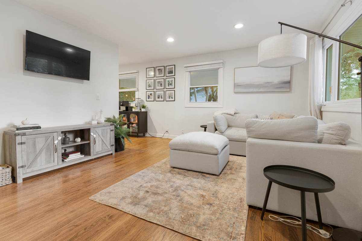 328 South 14th Street St. Charles, IL 60174 - Photo 5 of 26 a living room with furniture and a flat screen tv