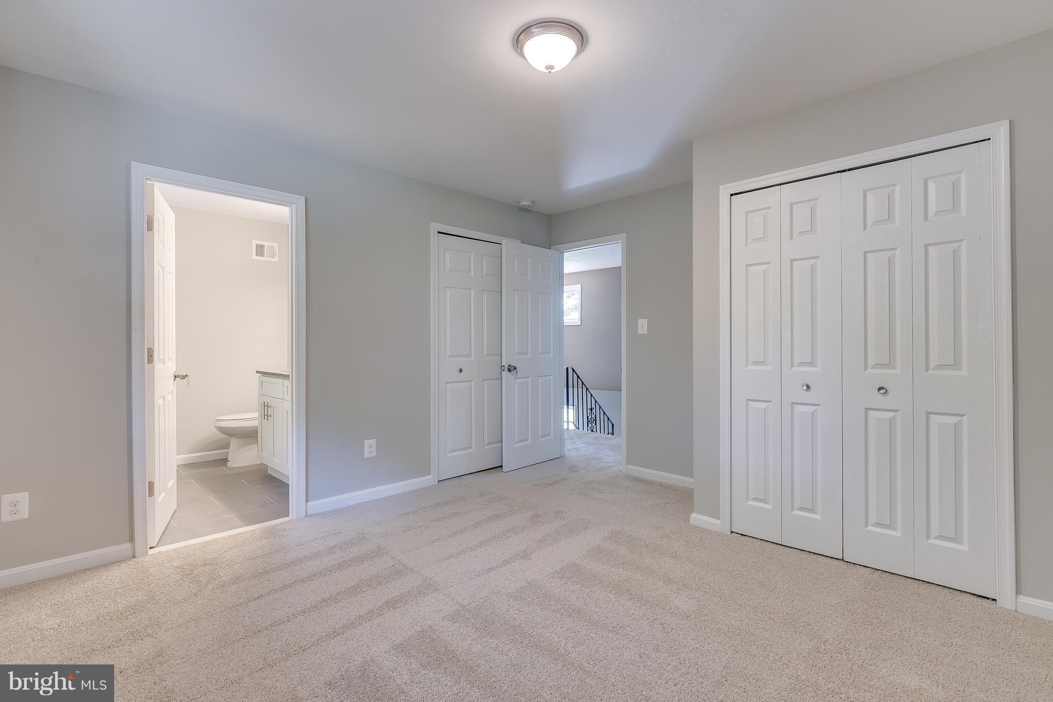 8601 Cromwell Drive Springfield, VA 22151 - Photo 11 of 20 Master Bedroom w/ New Carpet, Paint & Doors