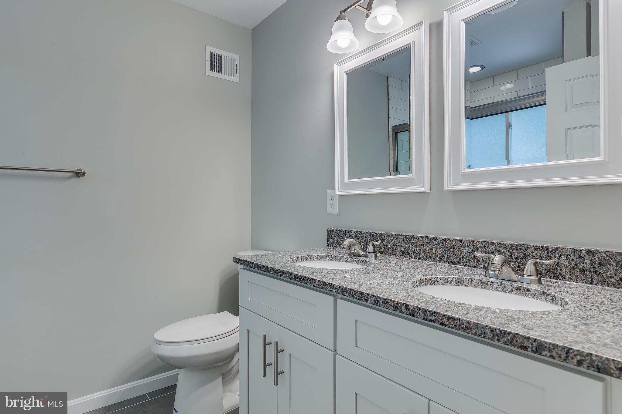 8601 Cromwell Drive Springfield, VA 22151 - Photo 12 of 20 Renovated Master Bath w/ Double Sinks
