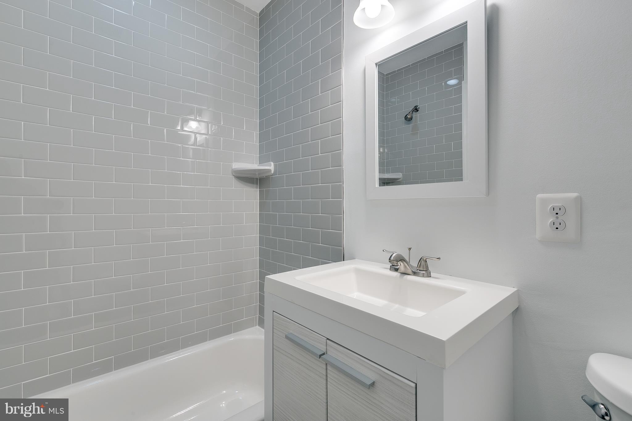 8601 Cromwell Drive Springfield, VA 22151 - Photo 14 of 20 Renovated Hall Bath