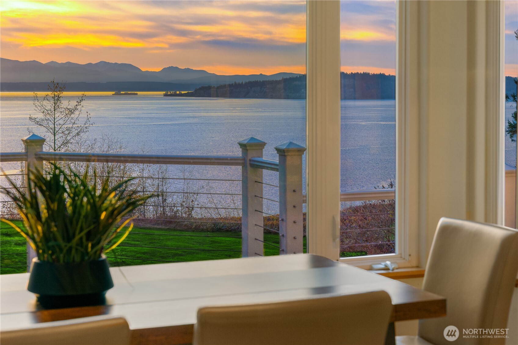 6790 Sills Road Clinton, WA 98236 - Photo 18 of 40 a view of balcony with furniture and a garden