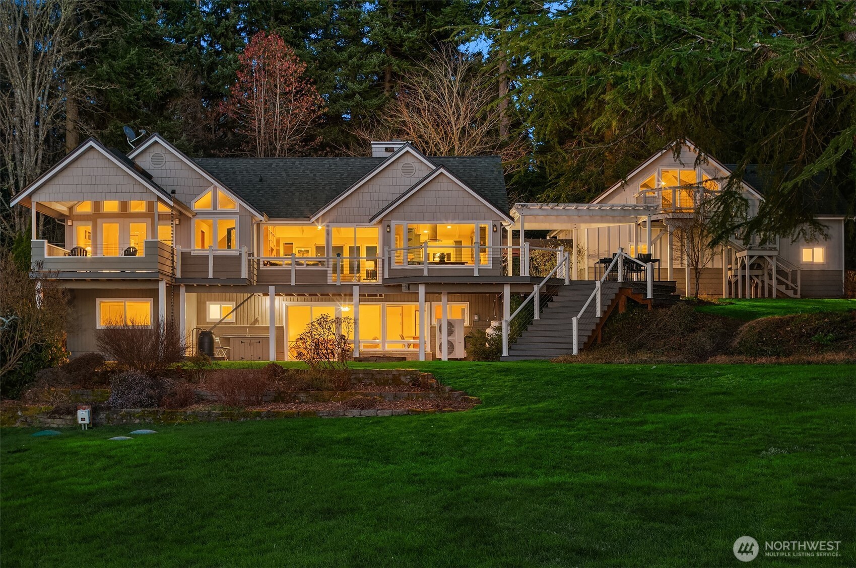 6790 Sills Road Clinton, WA 98236 - Photo 2 of 40 a front view of a house with a yard
