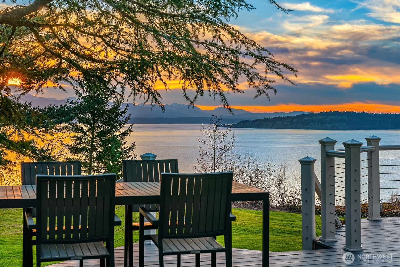 6790 Sills Road Clinton, WA 98236 - Photo 4 of 40 a view of a chairs and table in the patio