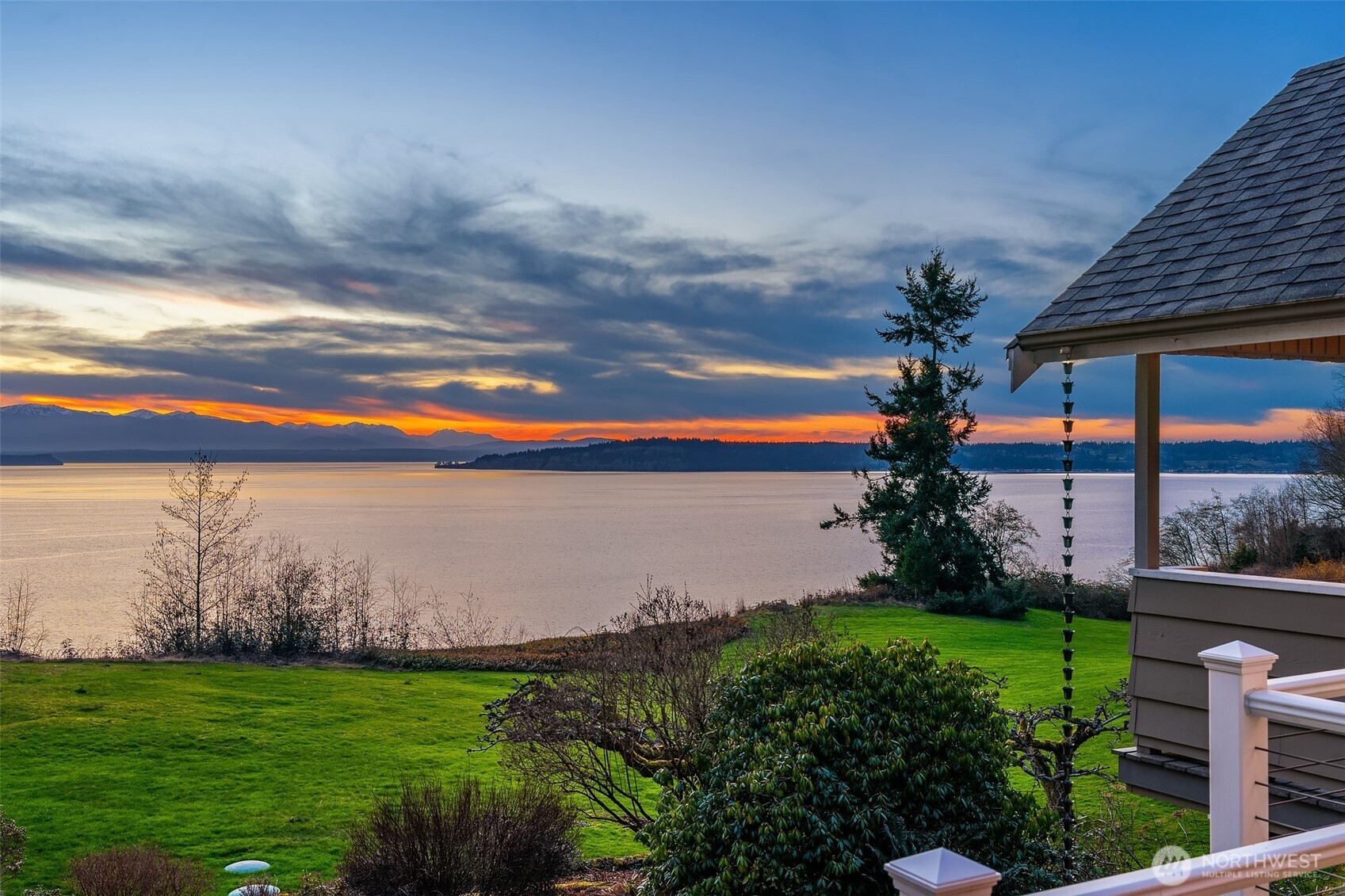 6790 Sills Road Clinton, WA 98236 - Photo 7 of 40 a view of a lake and a yard