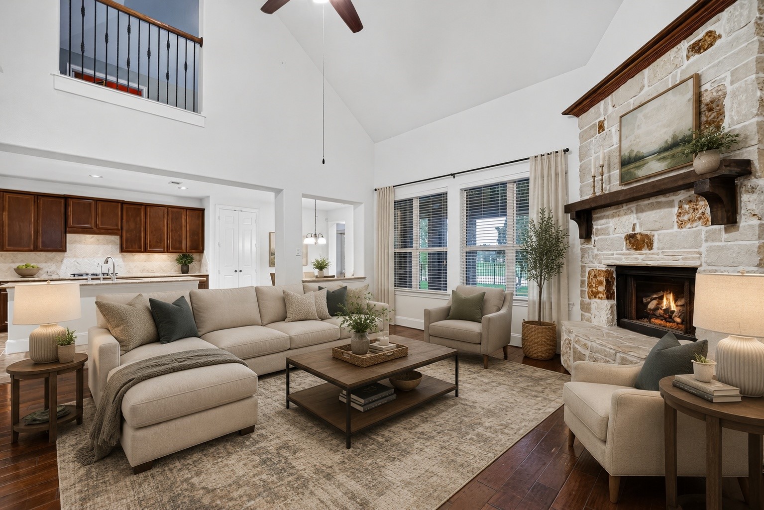 Virtually staged living room showcasing high ceilings, abundant natural light, and an inviting open layout.