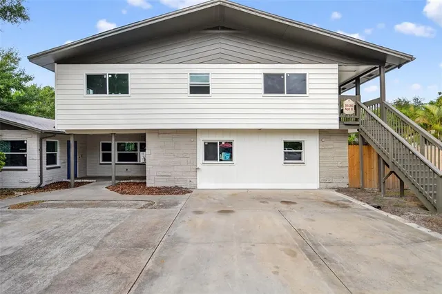 a front view of a house with a garage