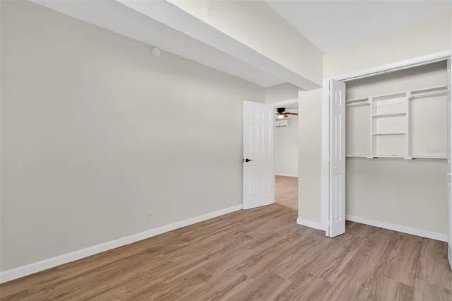 a kitchen with stainless steel appliances granite countertop a sink stove and microwave