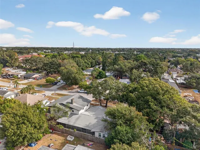 an aerial view of a city with lots of residential buildings