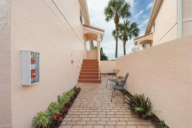 a view of a balcony with chairs
