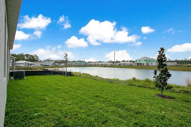 a view of a garden with a patio