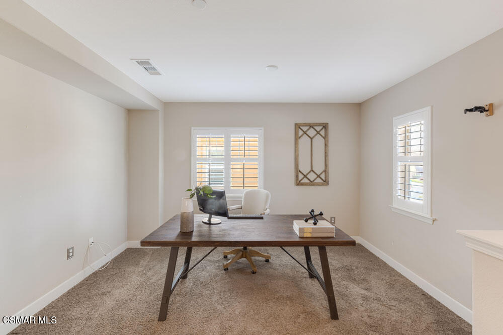 13988 Burdock Drive Moorpark, CA 93021 - Photo 16 of 35 a living room with furniture and a window