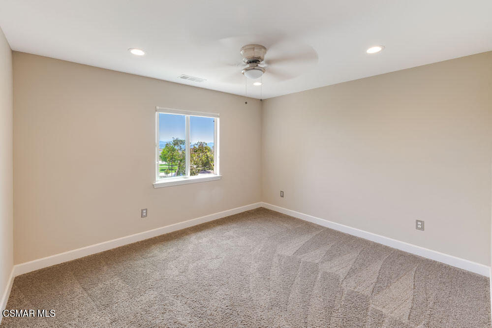 13988 Burdock Drive Moorpark, CA 93021 - Photo 18 of 35 wooden floor in an empty room with a window