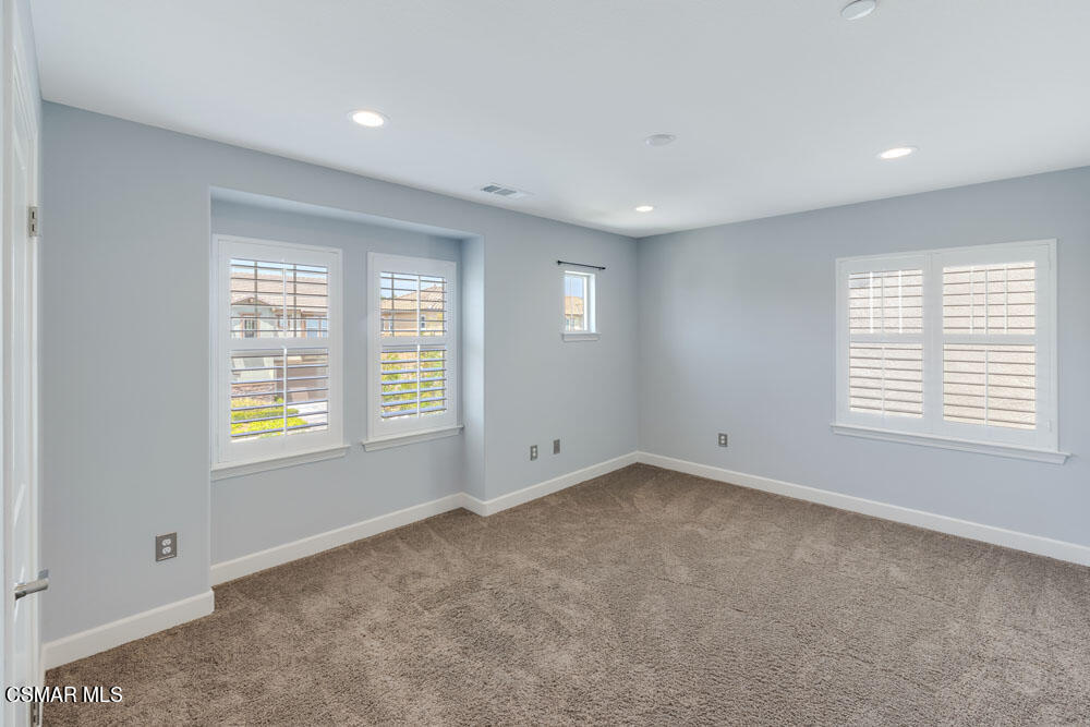 13988 Burdock Drive Moorpark, CA 93021 - Photo 19 of 35 a view of an empty room with a window