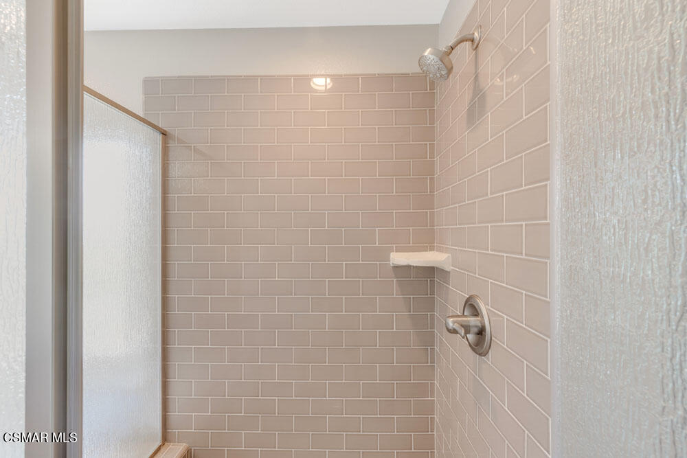 13988 Burdock Drive Moorpark, CA 93021 - Photo 23 of 35 a bathroom with a shower
