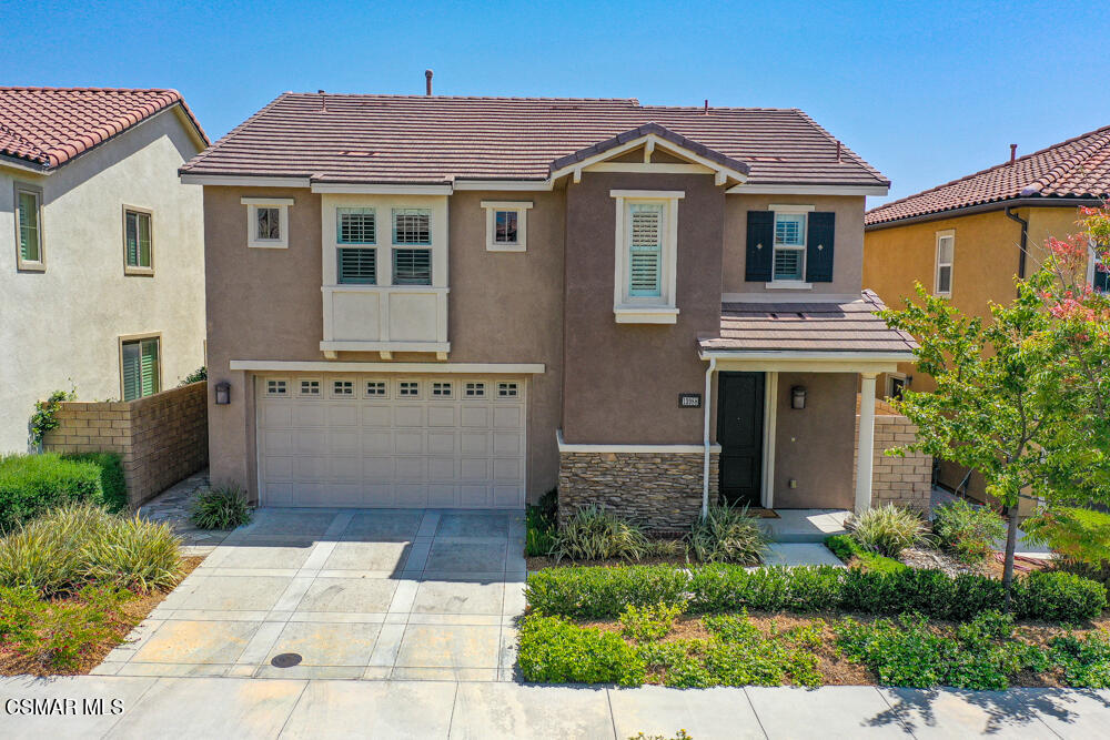 13988 Burdock Drive Moorpark, CA 93021 - Photo 31 of 35 a front view of a house with yard