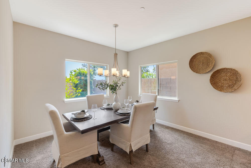 13988 Burdock Drive Moorpark, CA 93021 - Photo 6 of 35 a view of a dining room with furniture window and outside view