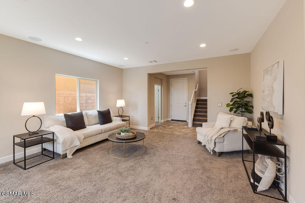 13988 Burdock Drive Moorpark, CA 93021 - Photo 7 of 35 a living room with furniture and a potted plant