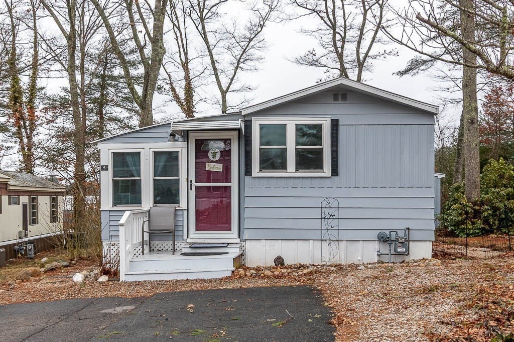 5 Timber Lane Wareham, MA 02571 - Photo 2 of 31 a front view of a house with a tree