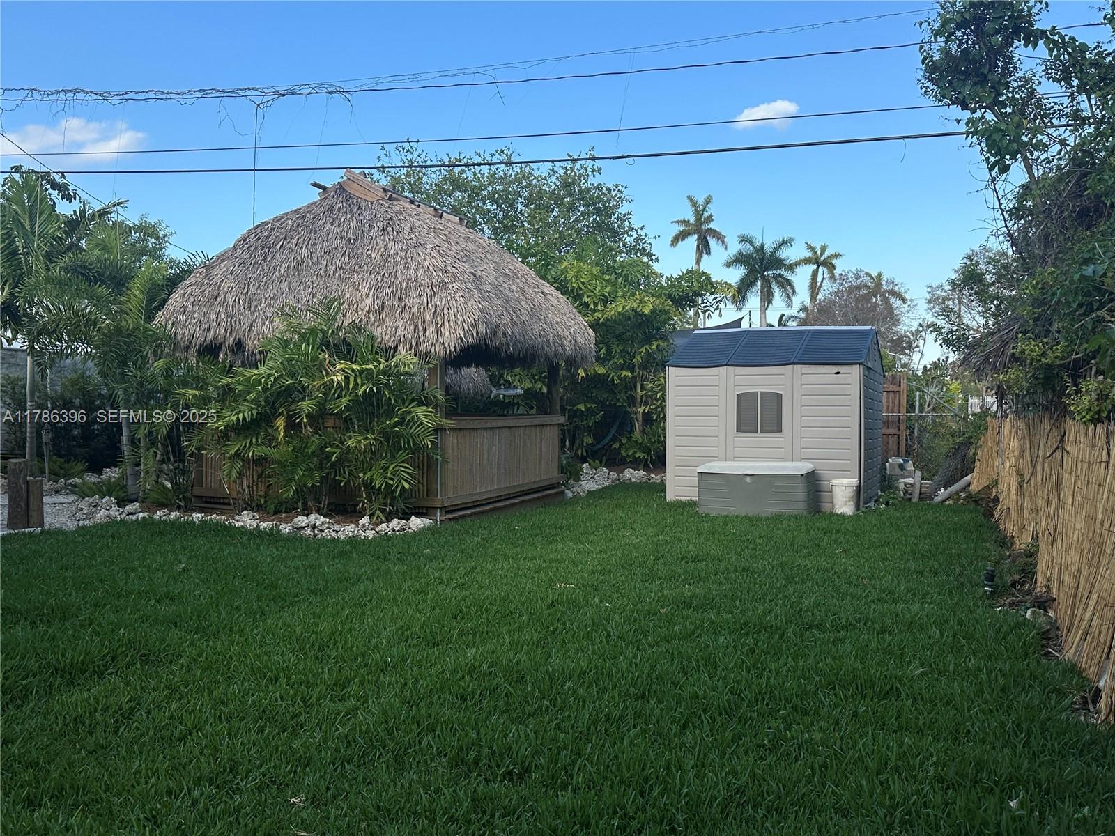 29035 Maine Road Homestead, FL 33033 - Photo 11 of 55 a view of a house with a garden