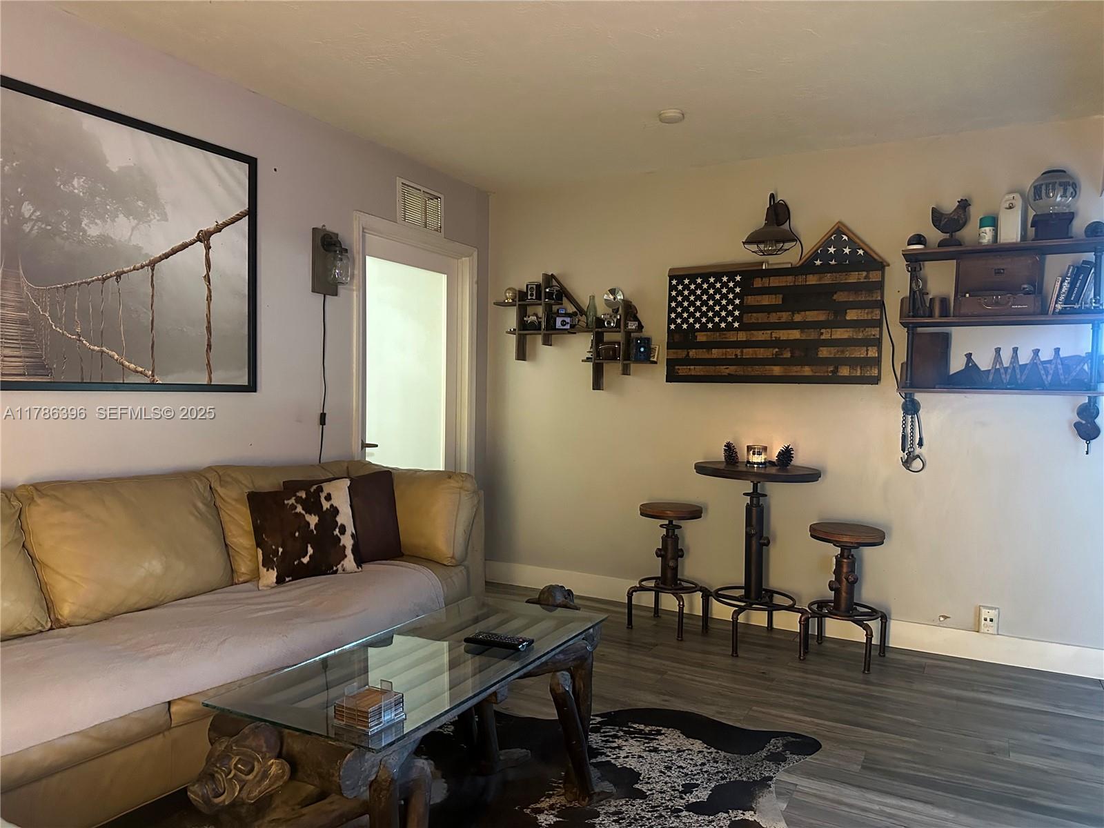 29035 Maine Road Homestead, FL 33033 - Photo 25 of 55 a living room with furniture and wooden floor