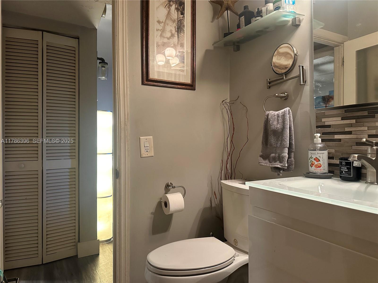 29035 Maine Road Homestead, FL 33033 - Photo 32 of 55 a bathroom with a sink a toilet and shower