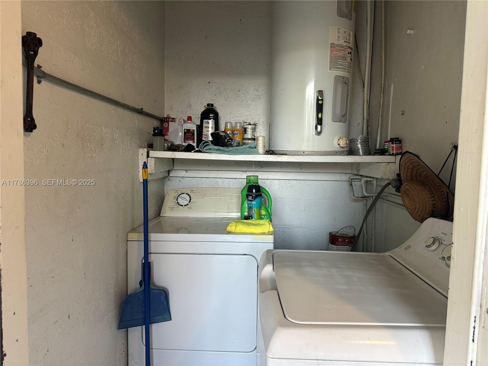 29035 Maine Road Homestead, FL 33033 - Photo 37 of 55 a bathroom with a sink and a mirror