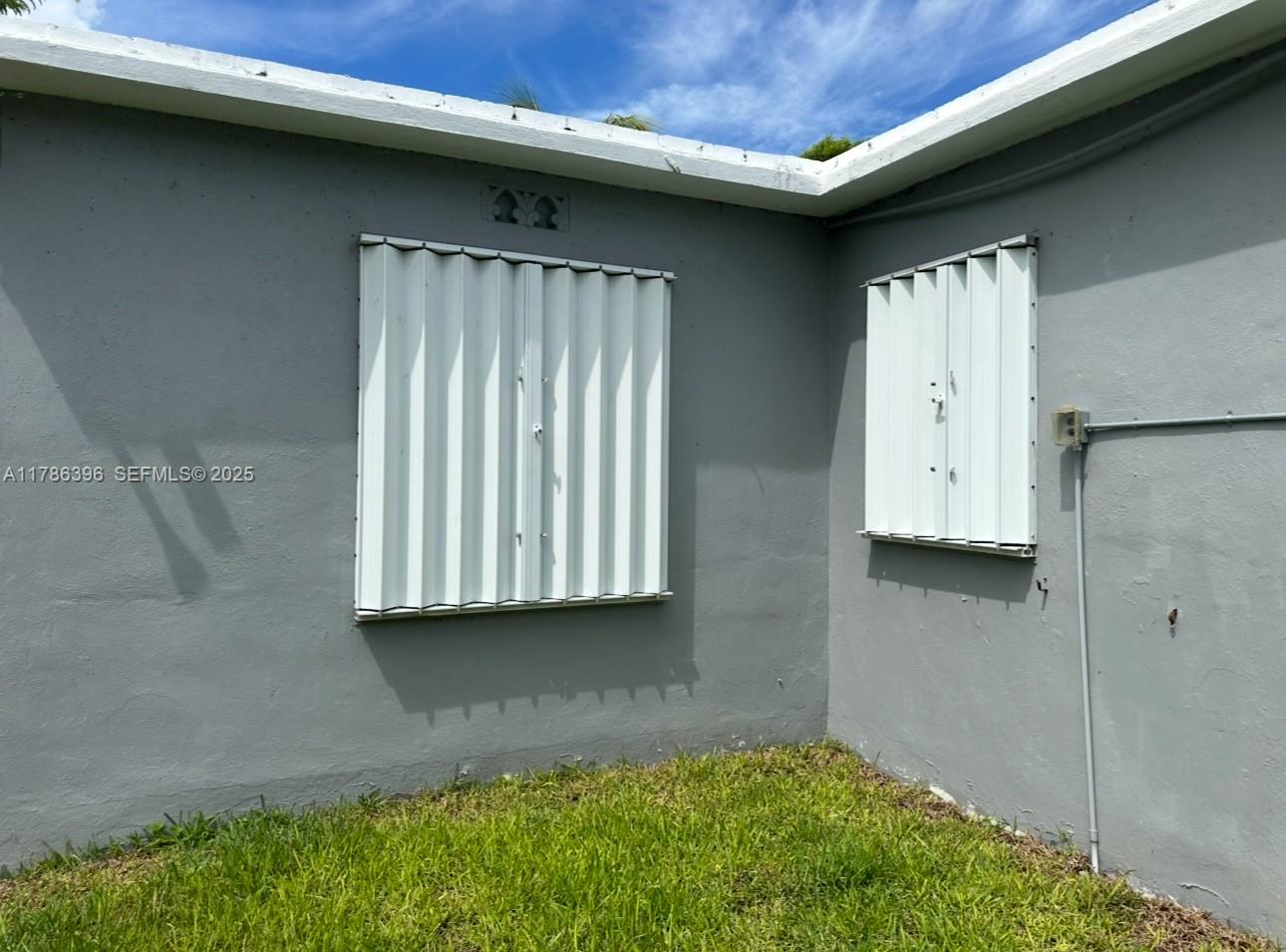 29035 Maine Road Homestead, FL 33033 - Photo 39 of 55 a view of a closet area with kitchen