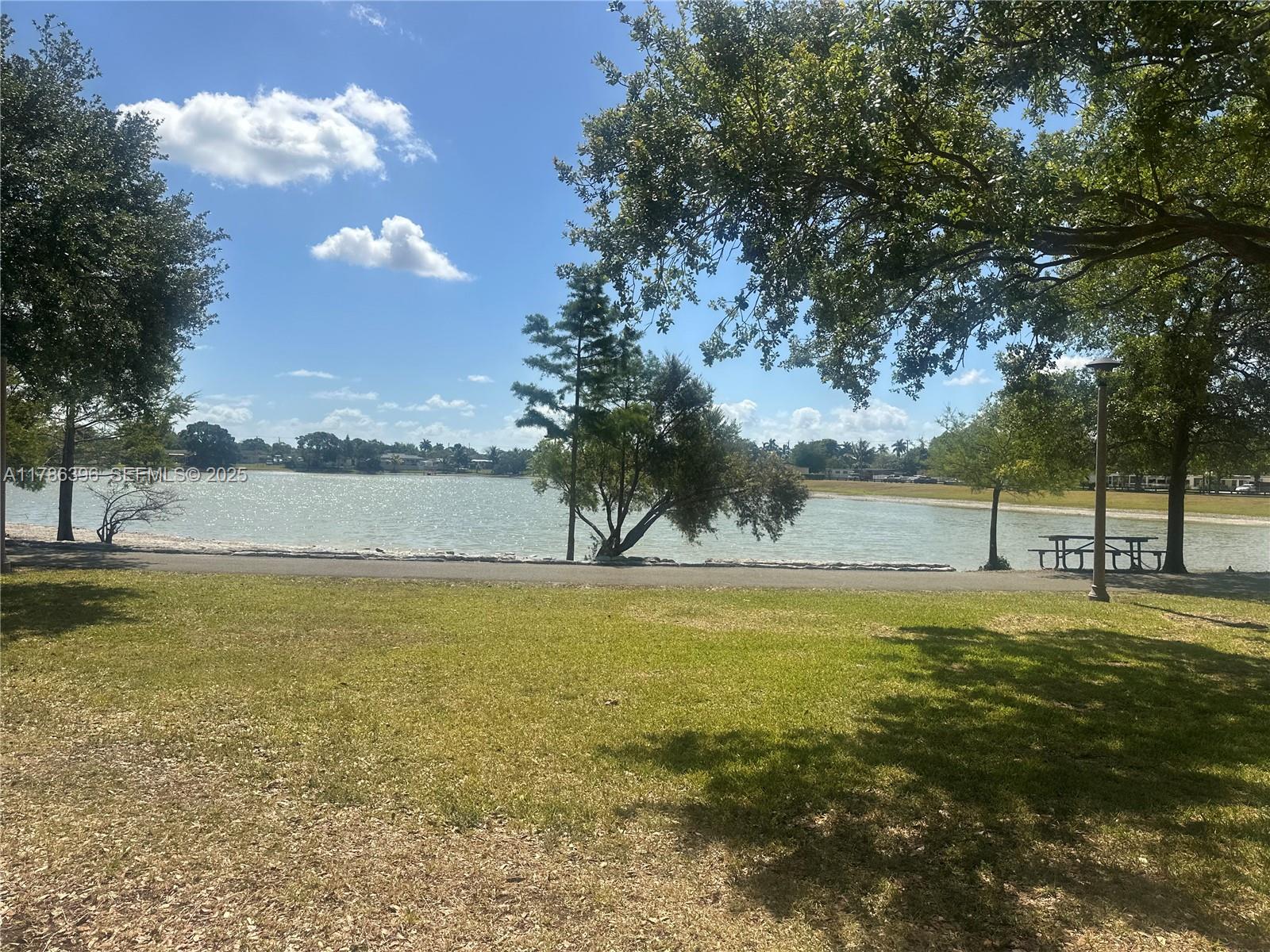 29035 Maine Road Homestead, FL 33033 - Photo 50 of 55 a view of a lake with a big yard