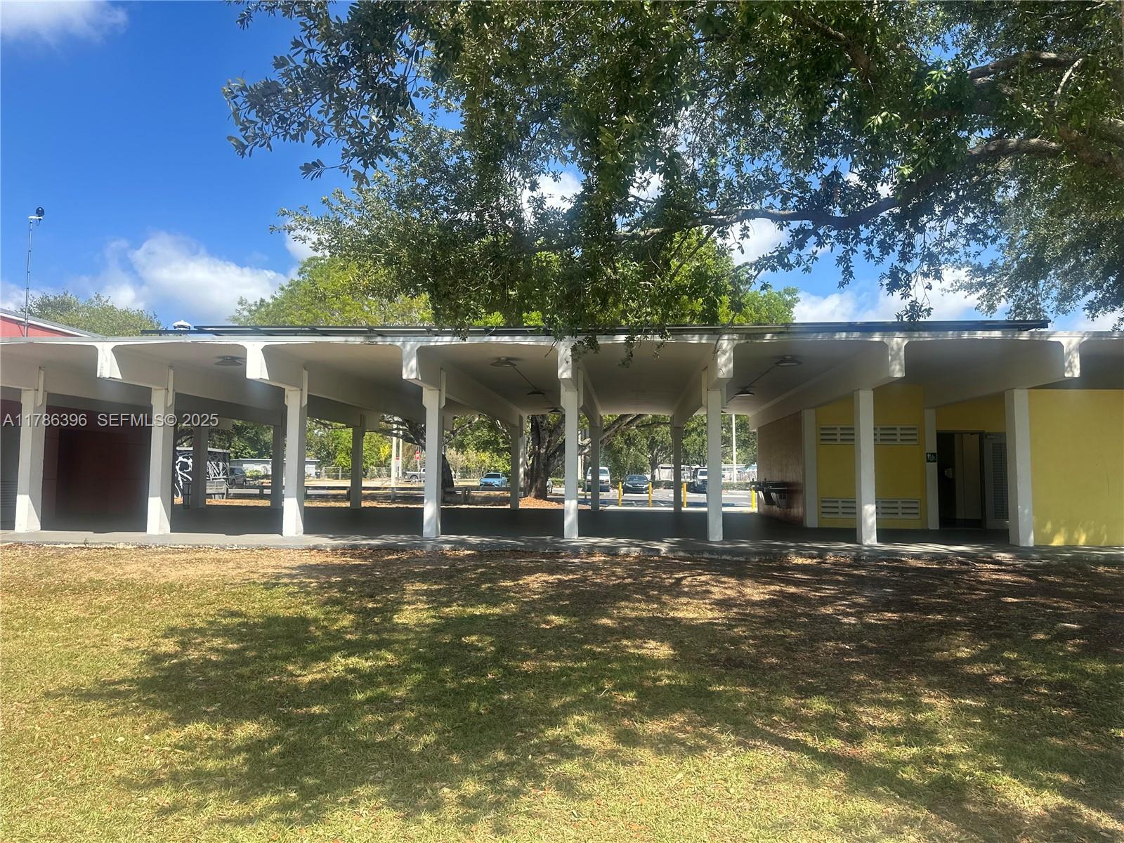 29035 Maine Road Homestead, FL 33033 - Photo 52 of 55 a view of a house with a yard and sitting area
