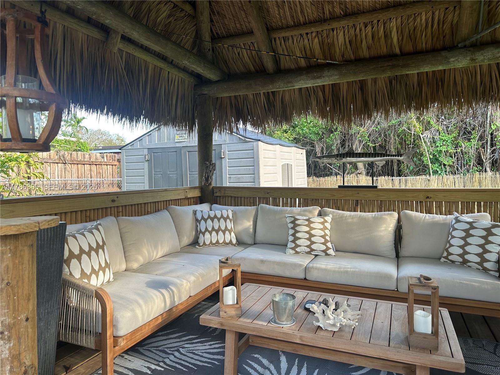 29035 Maine Road Homestead, FL 33033 - Photo 8 of 55 a outdoor living space with furniture and a patio