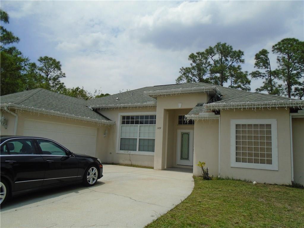 1439 Southwest Herder Road Port St. Lucie, FL 34953 - Photo 1 of 18